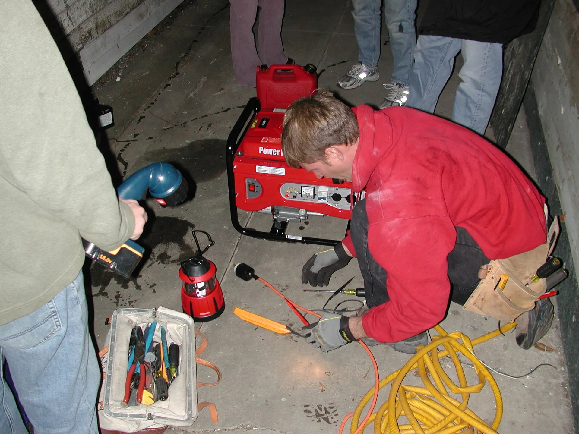 Technician repairing a home standby generator in Henderson County, North Carolina